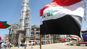 The Iraqi flag flutters during the opening of the Al-Dora refinery complex in Baghdad last month.