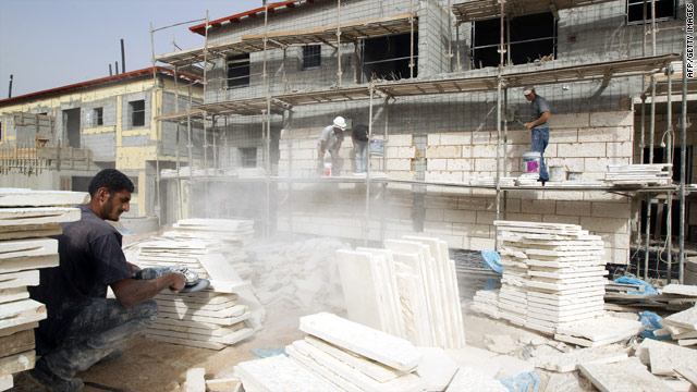 Workers build residential units last month in the Israeli settlement of Ariel, on the West Bank.