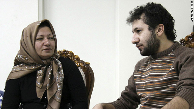 A picture released by Iran's state-run Press TV shows Sakineh Mohammadi-Ashtiani meeting with her son Sajjad.