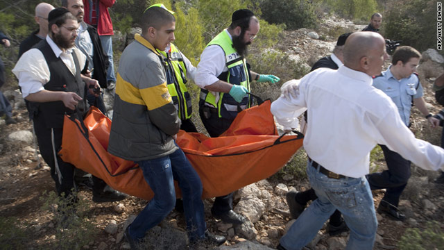 Israeli medics and volunteers carry the body of Kristine Luken near Mata, Israel, on Sunday.
