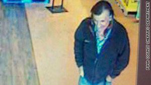 Authorities released a photo of a second man "possibly associated with the suspect."