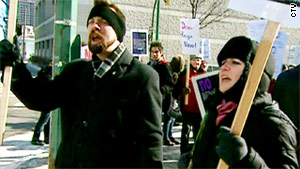 Protesters upset with the judge's ruling gather outside the Law Courts in Winnipeg on Friday.