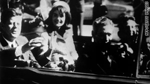 This photo was taken November 22, 1963, shortly before President Kennedy was shot to death in a Dallas motorcade.