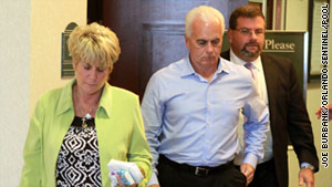 Cindy and George Anthony leave court on Tuesday after their daughter, Casey, was acquitted on murder charges.