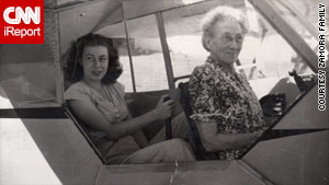 Peggy Zamora,  left, in her teenage years learned to fly an airplane.  Her grandmother is seated in front.