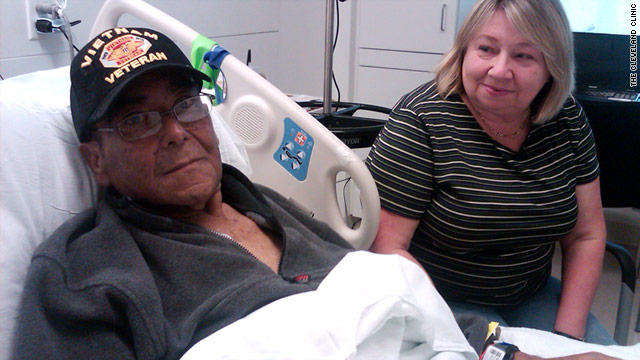 Wilson Alvarado rests at the Cleveland Clinic with his wife, Patricia, by his side. He recently had a liver transplant.