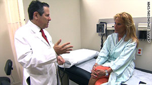 Dr. Arthur Agatston consults with Judy Willner about her checkup in his Miami office.