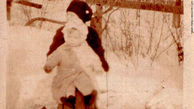 Albert Taber holds younger sister Florence in this  family photo from about 1924 in Staten Island, New York.