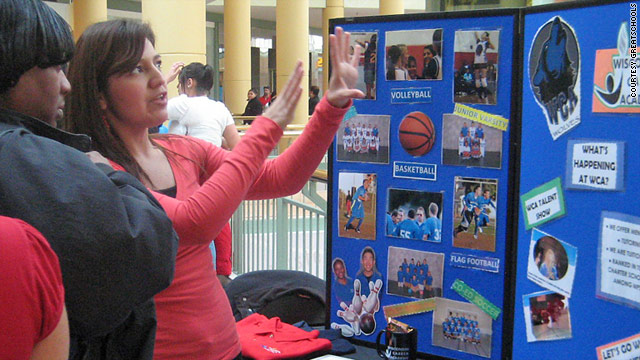 Parents meet with various schools during an education fair in Milwaukee, Wisconsin. School enrollment for fall will start soon.