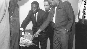 Ernest Withers photographed Martin Luther King Jr.'s aides standing above his suitcase after he was assassinated in 1968.