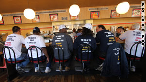 Caravan members fuel up at Waffle House before heading into Tampa, Florida.