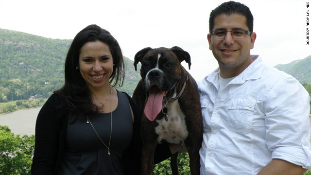 Michelle Przybyksi, 26, and Andy Lalinde, 33, pose with their dog Domino at West Point last month. The couple met through an exclusive online dating website for college students.