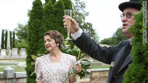 Sally Smith, acting as Margaret Mitchell, stands humbly by as a toast is made in the writer's honor.