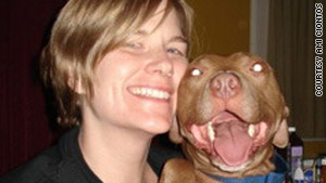 Ami Ciontos and Basil, a pitbull that she took from the largest dog fighting raid in history.