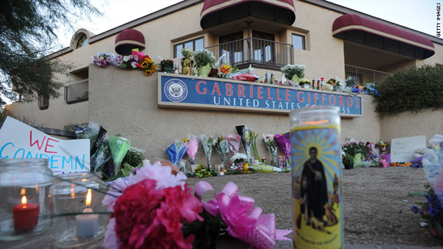 Flowers and candles were left outside the Tucson office of U.S. Rep. Gabrielle Giffords.