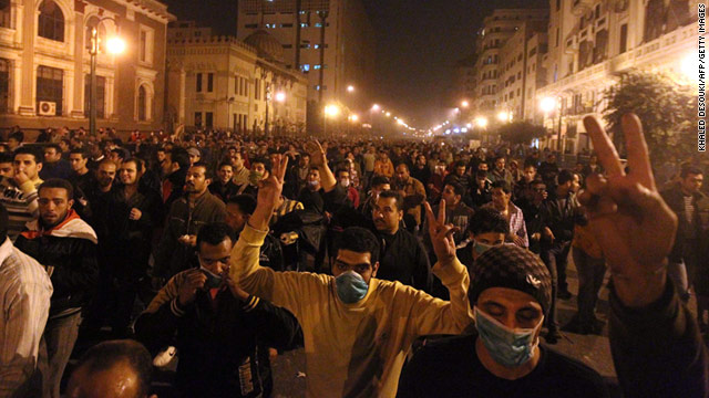 Egyptians demonstrate on the streets of Cairo, demanding the resignation of President Hosni Mubarak.