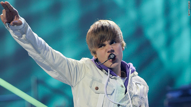 Johnston says Justin Bieber stands out because adults are "more able to warm to him than they were to his predecessors."