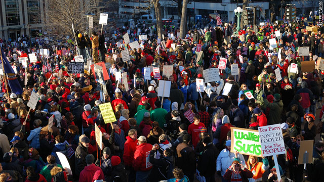 Protesters rally at Wisconsin's state capitol to oppose the governor's bill restricting collective bargaining rights.
