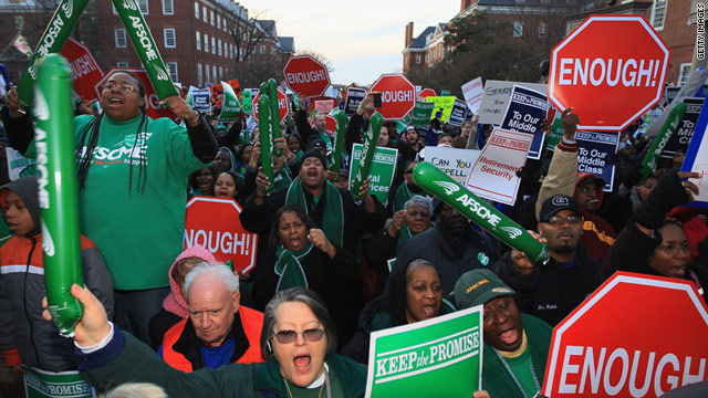Unionized public workers rally at the Maryland State Capitol to protest proposed pension changes.