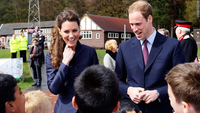 Kate Middleton and Prince William talk with youngsters from a local soccer club at Witton County Park in the U.K. on April 11.