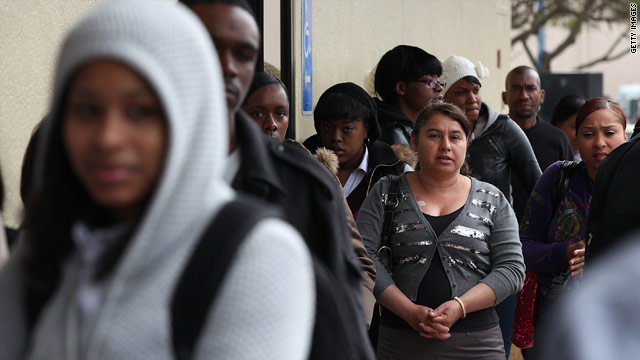 Job seekers wait in line at a one-day hiring event April 19 at a McDonald's in San Francisco. Hundreds showed up to apply.