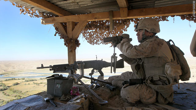 A U.S. Marine stands watch on October 22, 2010, in Kajaki, Afghanistan.
