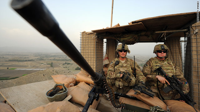 U.S. soldiers stand guard overlooking villages in Afghanistan's Khost province on Tuesday.