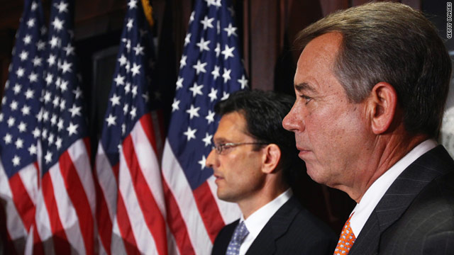 Speaker  John Boehner and House Majority Leader Eric Cantor listen to questions at RNC offices Tuesday.