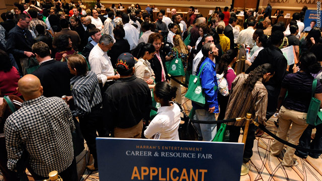 Applicants gather at a jobs fair in Las Vegas. Christine Owens says there are five unemployed workers for every job opening.