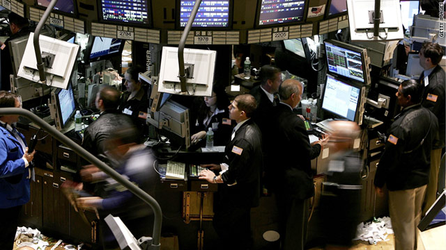 Traders do business on the floor of the New York Stock Exchange.