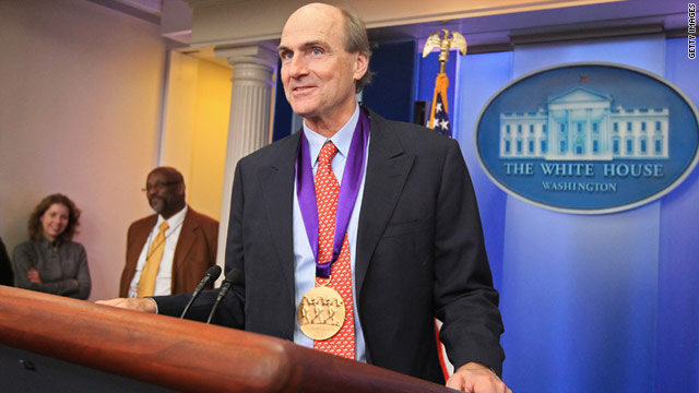 Musician James Taylor receives the National Medal of Arts and National Humanities Medal on Wednesday.