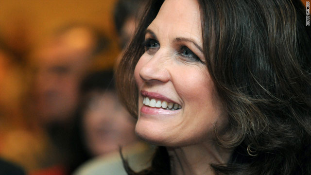 "I'm in, you're in," Michele Bachmann told a conference audience in Iowa, though in fact she is not, yet.
