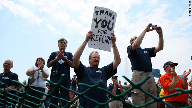 A union member holds a sign thanking Congress for healthcare reform during a May 6 rally in Washington.