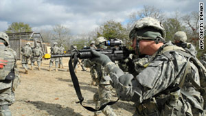 An Army recruit takes part in urban warfare training at Fort Benning, Georgia.