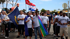 Service members prepare to march in the San Diego gay pride parade on July 16.