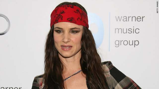 Actress/singer Juliette Lewis stopped by Warner's post-Grammy party on Sunday night.