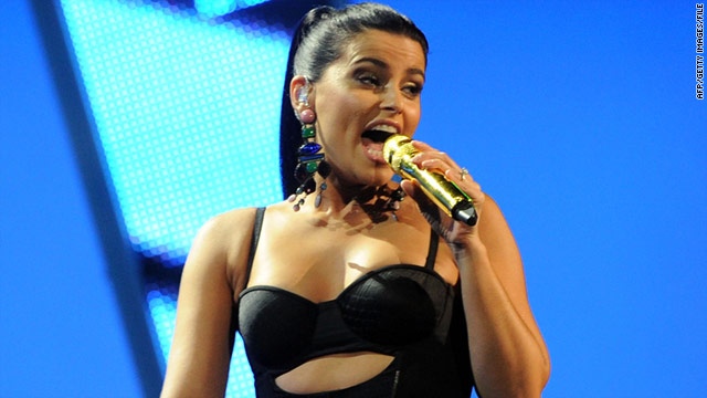 Singer Nelly Furtado, pictured in November, admits she performed for Moammar Gadhafi's family in 2007 for $1 million.