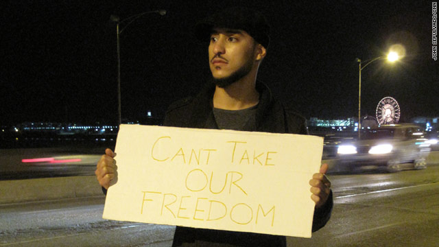 Khaled Ahmed, known as Khaled M., poses in Chicago as part of the "Can't Take Our Freedom" picture campaign.