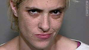 Samantha Ronson poses for a mug shot after being arrested for drunk driving near Baker, California.