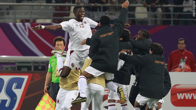 A delighted Yusuf Ahmed, No. 12, was mobbed by his teammates after scoring against China on Wednesday.