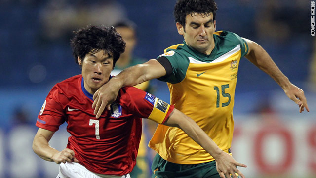 Australia's goalscorer Mile Jedinak, right, challenges South Korea midfielder Park Ji-Sung in Friday's 1-1 draw.