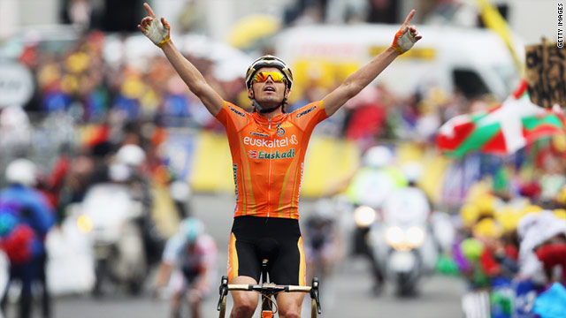 Spanish cyclist Samuel Sanchez celebrates after crossing the finish line during the 12th stage of the Tour de France.