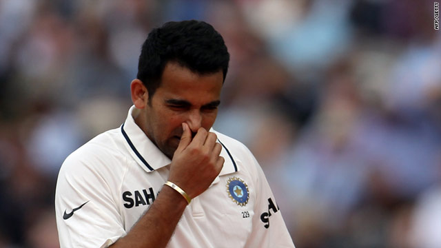 India's left-arm seamer Zaheer Khan limps off during the afternoon session at Lord's.