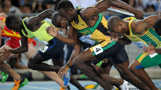 Usain Bolt (center) is out of the blocks first in his 100m heat at the World Athletics Championships in Daegu, South Korea.