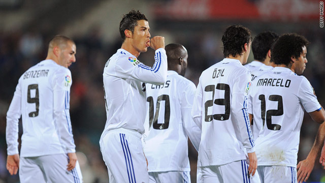 Cristiano Ronaldo - who became a father last summer - celebrates his opening goal against Getafe.