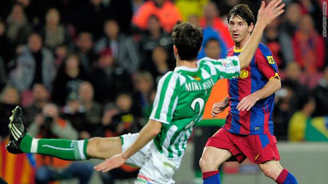 Lionel Messi watches as his cute chip opens the floodgates for Barcelona in the cup quarterfinal against Betis.