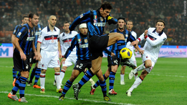 Inter Milan's longtime servant Javier Zanetti clears the ball during Saturday's 4-1 victory at home to Bologna.