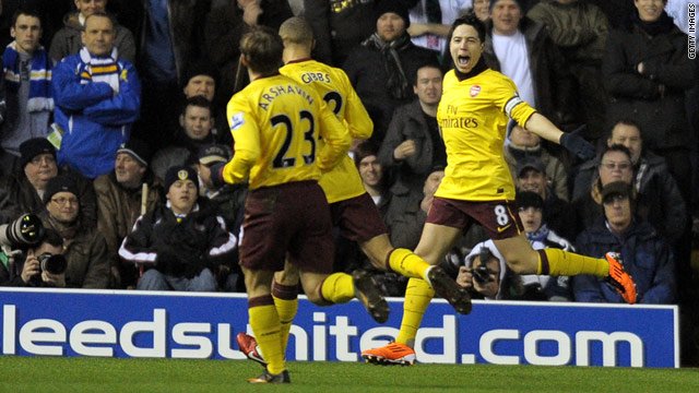 Samir Nasri (far right) celebrates his opening goal in Arsenal's 2-1 FA Cup third round replay win at Leeds United.