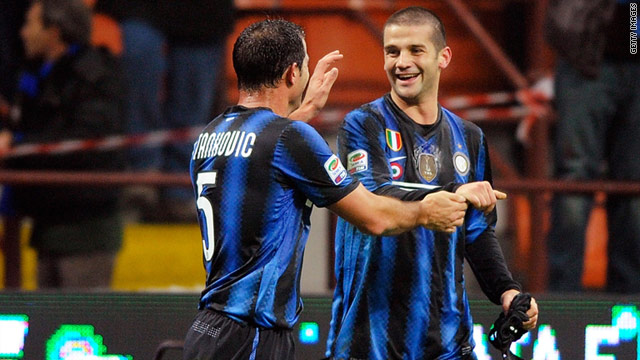 Christian Chivu (right) celebrates his winning goal as Inter Milan maintained their unbeaten run under coach Leonardo.