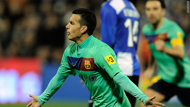 Pedro Rodriguez celebrates his first half goal for Barcelona in Alicante.